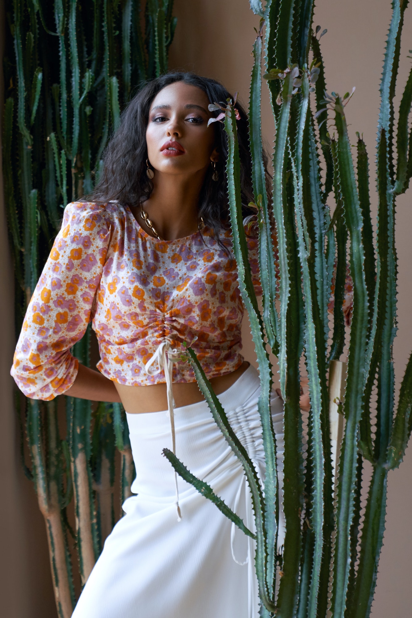 gorgeous-fashionable-mulatto-female-model-among-cactuses.jpg